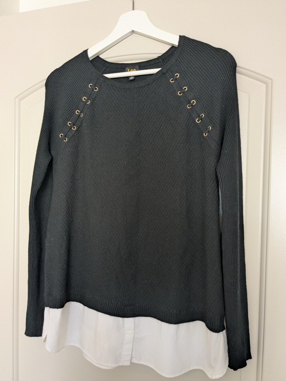 Lee black ribbed knit sweater with gold grommet details and attached white shirt